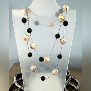 SOLD /NOTFORSALE Necklace with “floating” blackcream multi size36” long